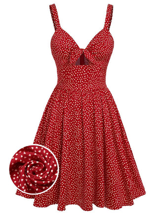She slips into this Red 1950s Spaghetti Strap Heart Print Dress and suddenly it's a 1950s daydream