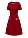 This Red 1960s Solid Faux Pocket Dress wraps her in 1960s elegance, one twirl at a time
