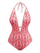 She's wearing Red 1970s Deep V-Neck Halter Baroque Prints Swimsuit and the whole beach remembers the 1970s