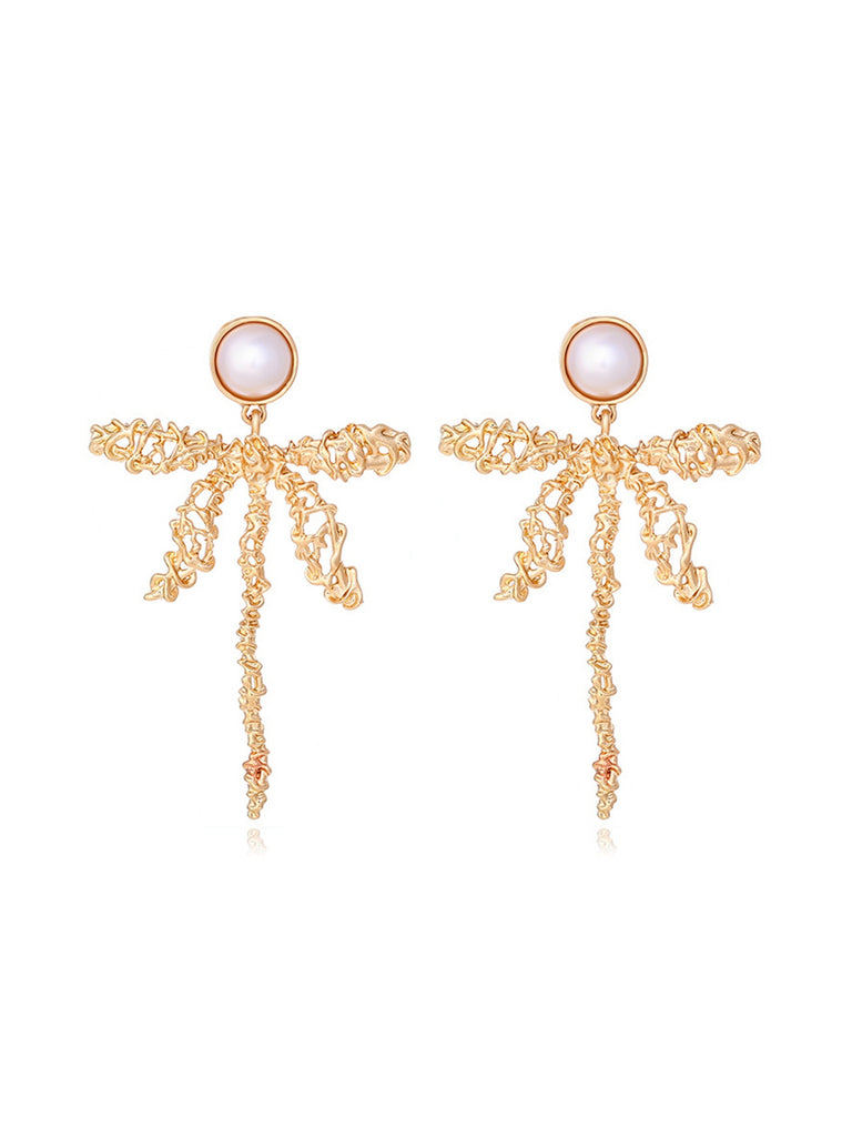 She adds this Retro Pearl Dragonfly Wire Dangle Earrings and suddenly it's 1950s perfection
