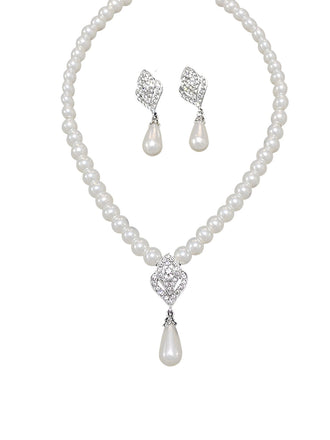 She adds this Rhinestoned Imitation Pearl Necklace & Earrings Set and suddenly it's vintage perfection
