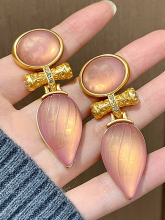 She adds this Rose Gold Vintage Water Drop Stripe Earrings and suddenly it's 1950s perfection