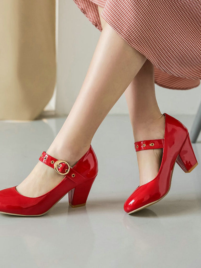 This Round Toe Patent Leather Buckle High Heels whispers vintage secrets to those who notice