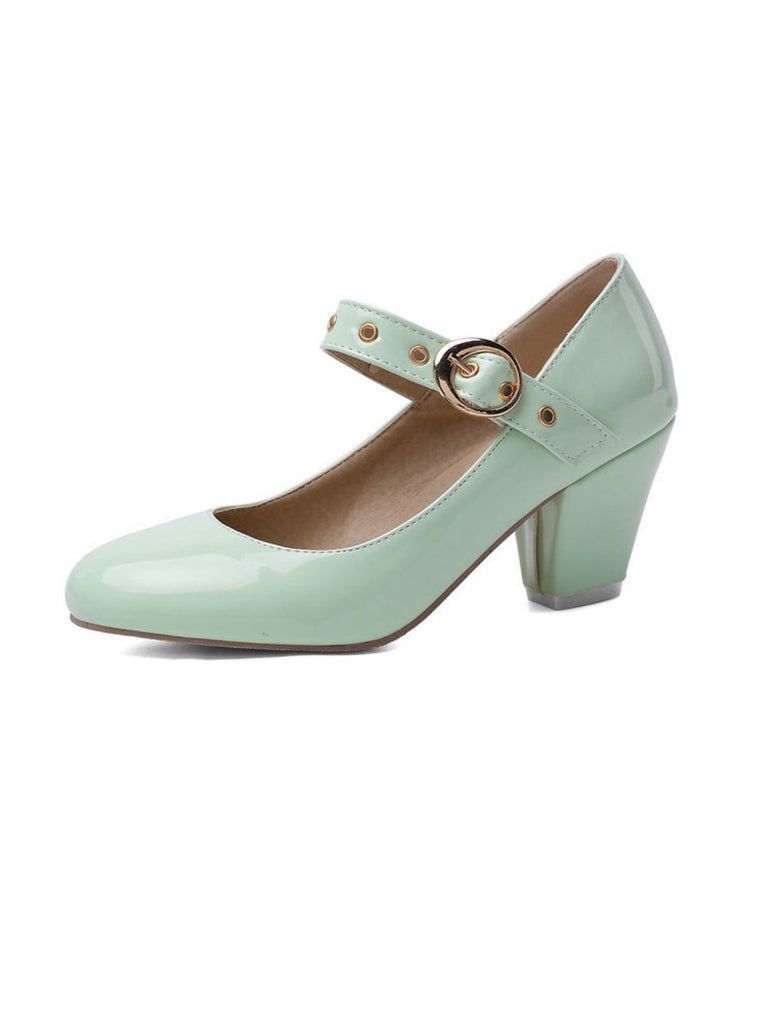 She finds her vintage story in this Round Toe Patent Leather Buckle High Heels