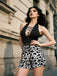 Black 1980s Punk Halter Hollow Cow Pattern Romper