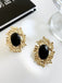 Gold-Rimmed Black Gemstone Earrings