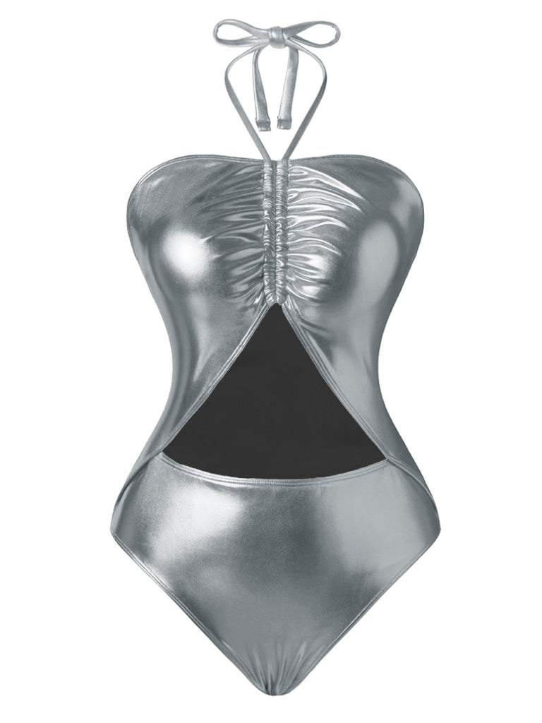 Metallic silver swimsuit with a black triangle design on a white background