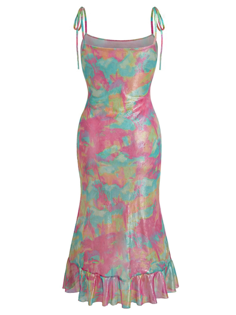 Multicolored tie-dye dress with ruffled hem on a white background