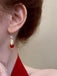 She adds this Vintage Animal Alloy Earrings and suddenly it's 1950s perfection