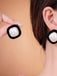 She adds this Vintage Flocked Square Earrings and suddenly it's 1950s perfection