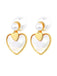 She adds this Vintage Gold Edged Pearl Heart Earrings and suddenly it's 1950s perfection