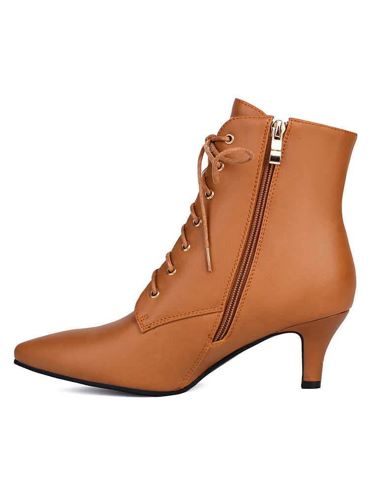 She finds her 1950s story in this Vintage Lace-Up Kitten Heel Ankle Boots