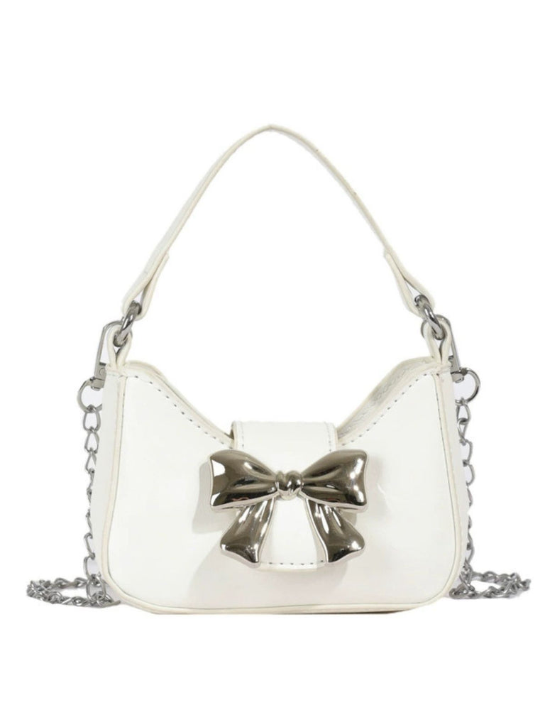 This Vintage Leather Bow Handle Handbag carries 1950s stories waiting to be told