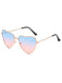 She finds her 1950s story in this Vintage Metal Heart Frame Sunglasses
