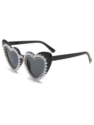 She finds her 1950s story in this Vintage Rhinestone Heart Frame Sunglasses