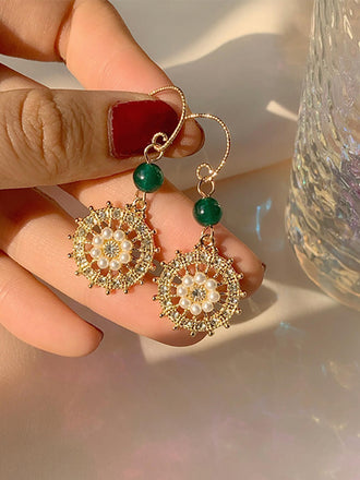 She adds this Vintage Rudder Pearl Green Gemstone Earrings and suddenly it's 1950s perfection