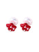 Pair of red star-shaped earrings with white polka dots on a white background