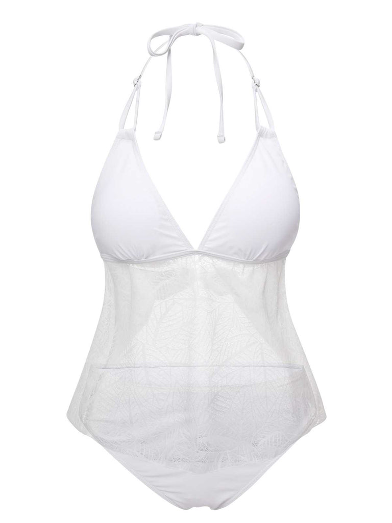She's wearing White 1930s Halter Backless Solid Swimsuit and the whole beach remembers the 1930s