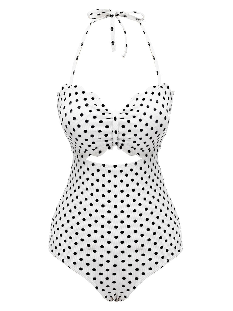 She's wearing White 1940s Polka Dot Lace Up Halter Swimsuit and the whole beach remembers the 1940s