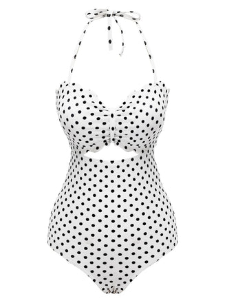 She's wearing White 1940s Polka Dot Lace Up Halter Swimsuit and the whole beach remembers the 1940s