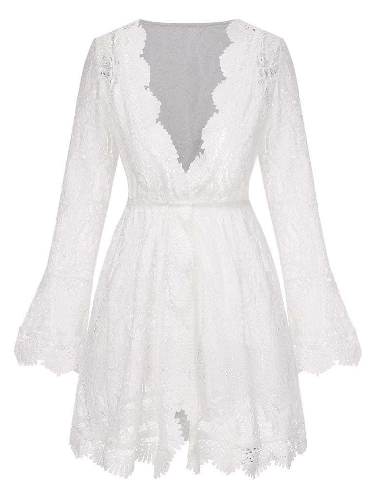 She's wearing White 1940s Solid Lace Beach Cover Up and the whole beach remembers the 1940s