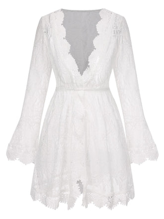 She's wearing White 1940s Solid Lace Beach Cover Up and the whole beach remembers the 1940s