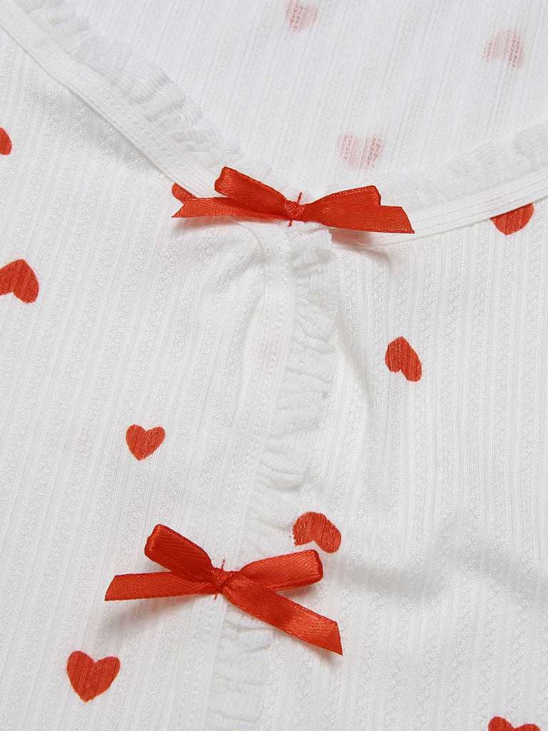 This White 1970s Curled Heart Bow Long Sleeve Pajamas whispers 1970s secrets to those who notice