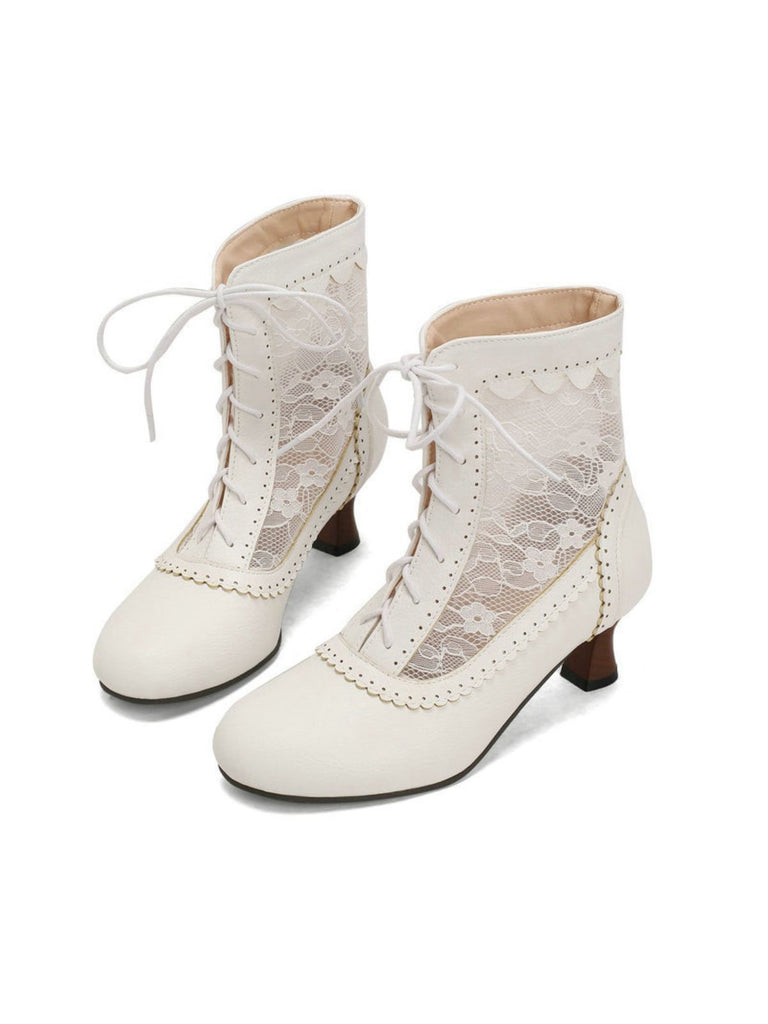 White lace-up boots on a white background