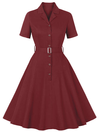 She slips into this Wine Red 1950s Solid Lapel Belted Dress and suddenly it's a 1950s daydream