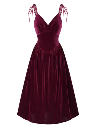 She slips into this Wine Red 1950s Spaghetti Strap Velvet Nightgown and suddenly it's a 1950s daydream