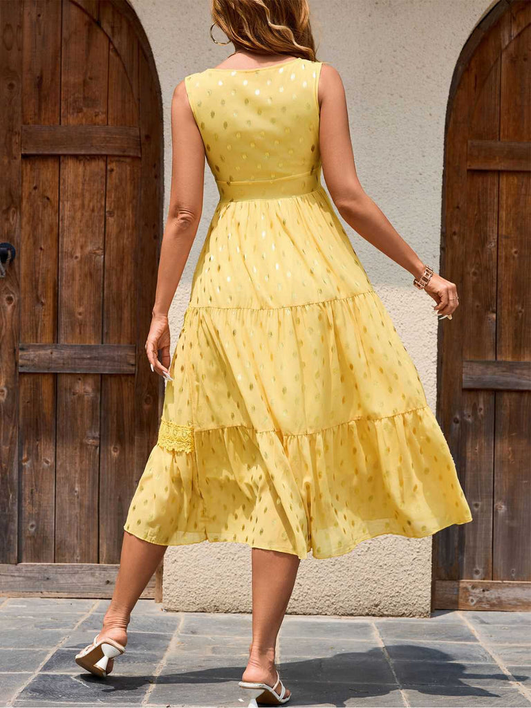 This Yellow 1950s Lace Patchwork Polka Dots Dress wraps her in 1950s elegance, one twirl at a time