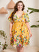 Yellow 1950s V-Neck Belted Floral Dress — vintage elegance for the modern woman