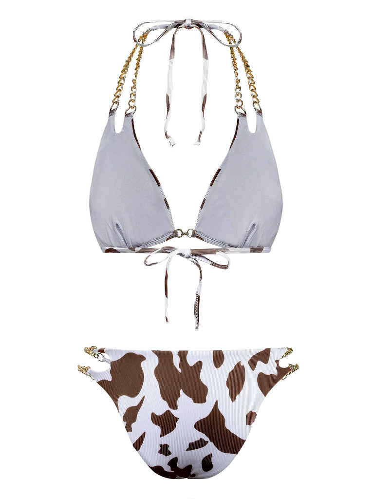 Back view of the brown and white cow print bikini with gold chain accents.