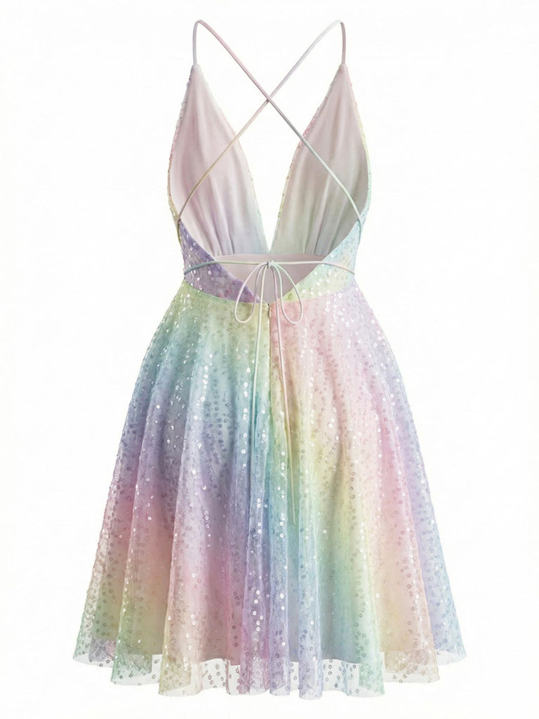 Back view of the rainbow sequin mini dress showcasing the thin criss-cross adjustable straps and open-back design.