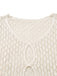 Close-up of the intricate oval cut-out detailing and V-neckline on a cream crochet tunic.