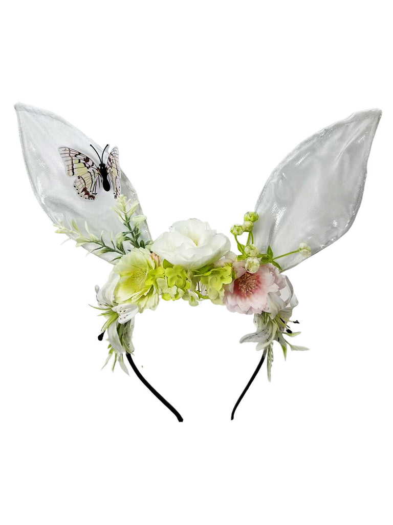 Whimsical pink fairycore headband with sheer bunny ears, silk flowers, and a purple butterfly accent.