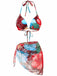 A vibrant three-piece swimwear set featuring a triangle bikini top and matching sarong cover-up in a mix of red leopard spots and blue tropical floral prints.