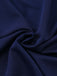 Macro view of the navy blue fabric texture, highlighting its soft, smooth, and slightly stretchy quality.