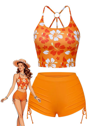 A vibrant orange two-piece bikini featuring white and red tropical floral prints, shown with a vintage summer fashion illustration.