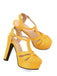 Pair of bright yellow sandals featuring a thick block heel and a secure T-shaped ankle strap.