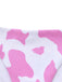 Close-up of the ribbed pink and white cow print fabric.