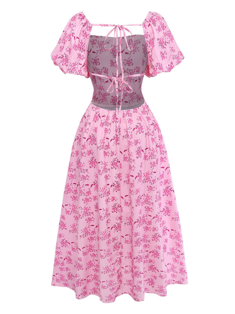 Rear view of the pink floral dress showcasing the square back and tie-neck detail.