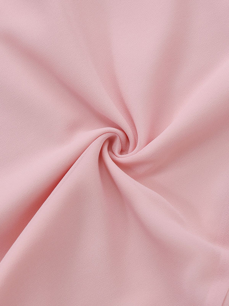 Macro view of the soft, slightly translucent pink chiffon fabric texture, highlighting its high-quality feel.