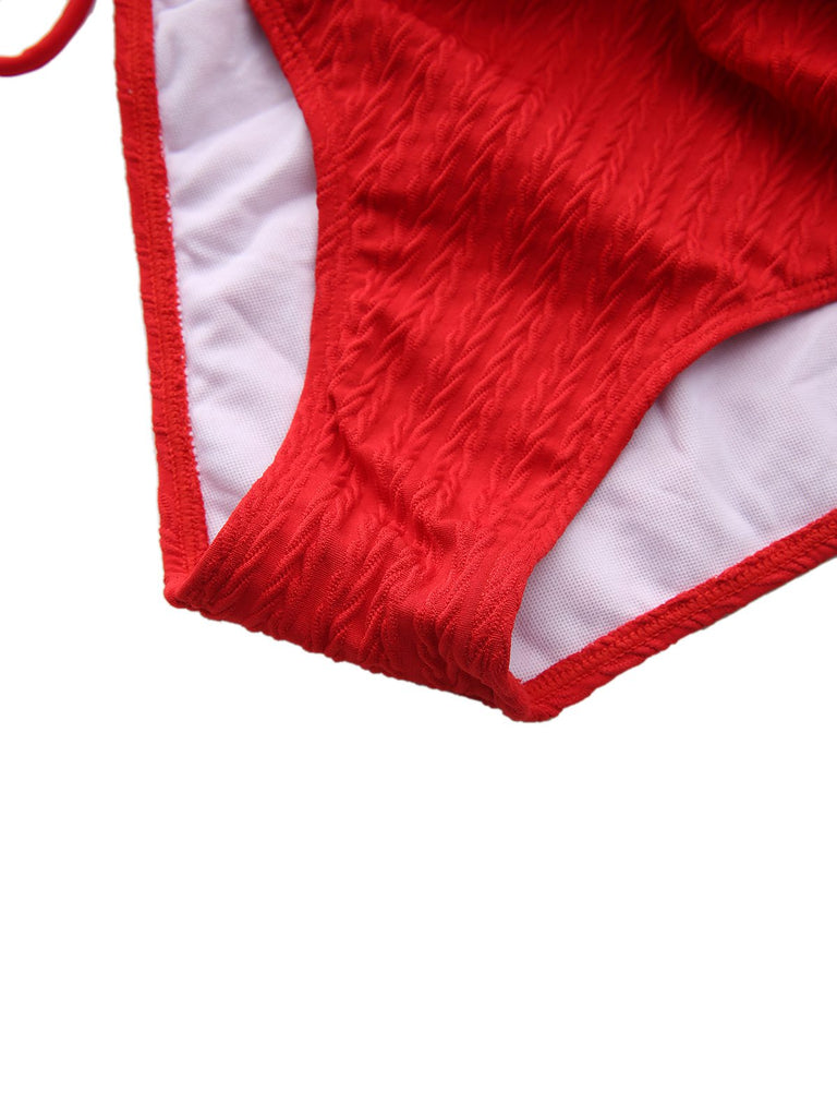Red textured bikini bottom on a white background