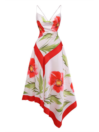 A stunning white cami dress featuring large vibrant red floral prints, a graceful cowl neckline, and a modern asymmetrical handkerchief hem.