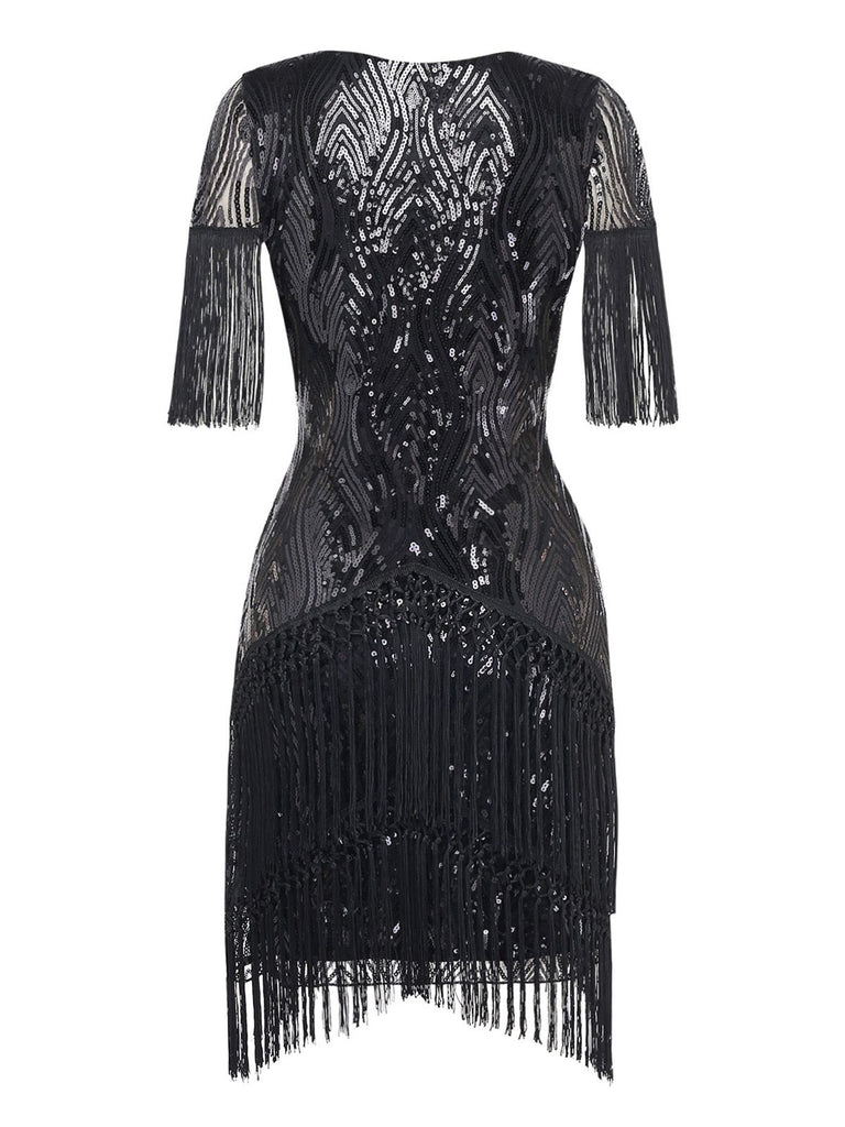 Back view of the shimmering black sequin evening dress, showcasing its elegant V-neckline and tiered fringe.