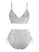 Back view of the silver shimmering bikini set, showcasing the metallic finish and high-waist fit.