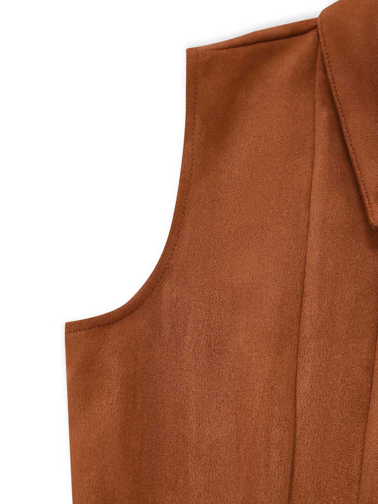 Detailed view of the sleeveless armhole construction and shoulder seam of the brown romper.