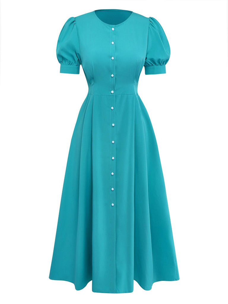 A vibrant teal A-line midi dress featuring short puff sleeves, a round neckline, and a full-length functional button-down front with white pearl-style buttons.