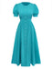 A vibrant teal A-line midi dress featuring short puff sleeves, a round neckline, and a full-length functional button-down front with white pearl-style buttons.